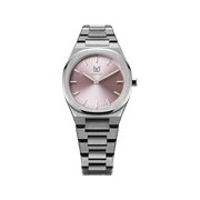 Unveil your captivating beauty with this Makydo women's watch, where strength and grace intertwine in perfect balance. The light pink dial, like a soft blush of dawn, emanates a tender radiance and kindling passions. The brilliant, highly transparent sapphire crystal with anti-reflective coating expose the sophisticated silver baton hands with BGW9 Lume. The flawless symmetry of the 316L Stainless Steel integrated bracelet complimented with a 6.7mm of slim case powered by a sturdy Miyota quartz movement.